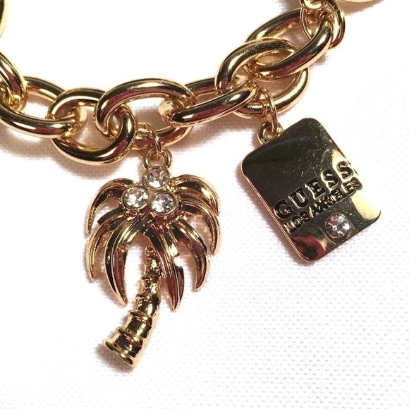 𝅺3/$29! GUESS Gold Charm Bracelet Palm Tree - Picture 6 of 7